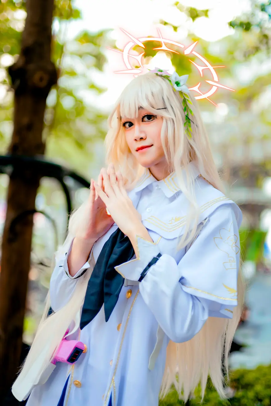 SaltyAom's nagisa cosplay holding hands while looking at the camera